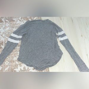 Grey long sleeved shirt with white stripes